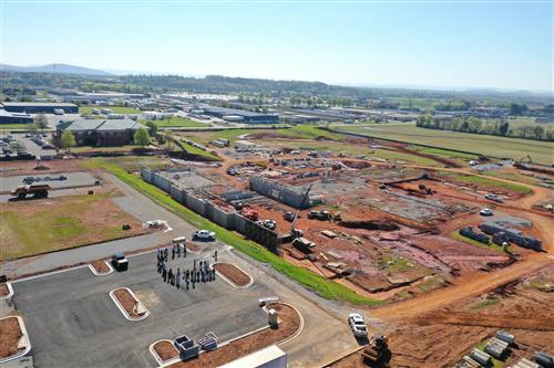 aerial view of middle school construction site 