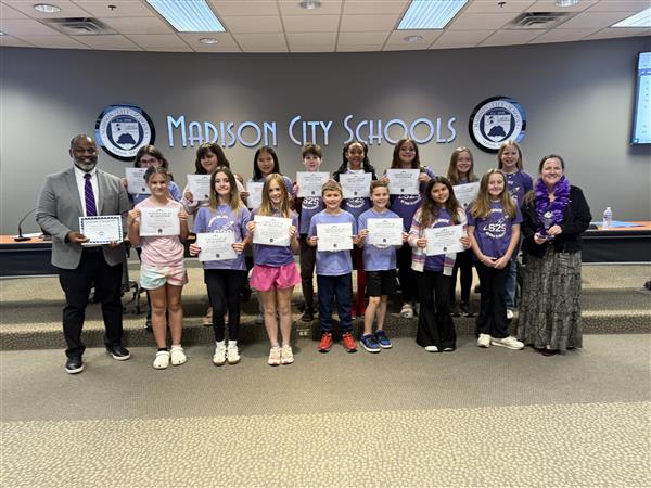 Rainbow's S2S Team being recognized at a board meeting